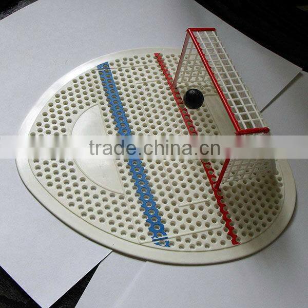 Sport themed urinal screen mat with hockey ball