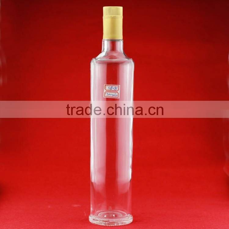 Hot selling cheap embossed spirit bottles glass vodka bottles 700ml french brandy bottle with cork