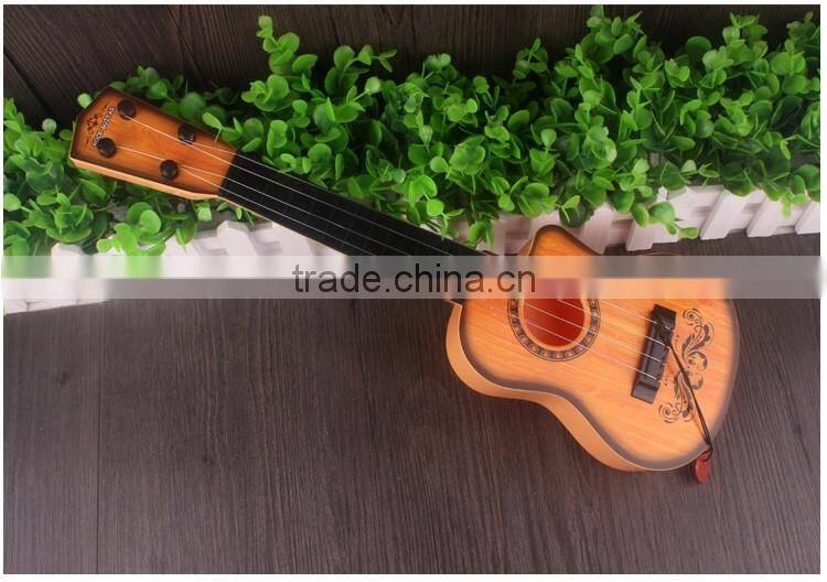 Plastic toy Simulation 4-string guitar toys educational toys for kids.simulation plays the guitar toys ,cheap toys,EN71. 7P