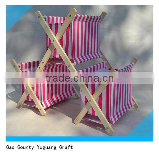 wooden magazine rack with cloth bags