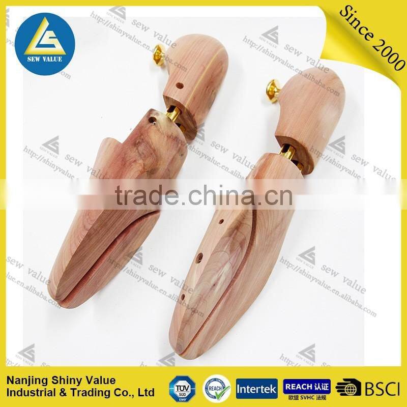 American red cedar wood type wooden shoe stretcher with metal cap