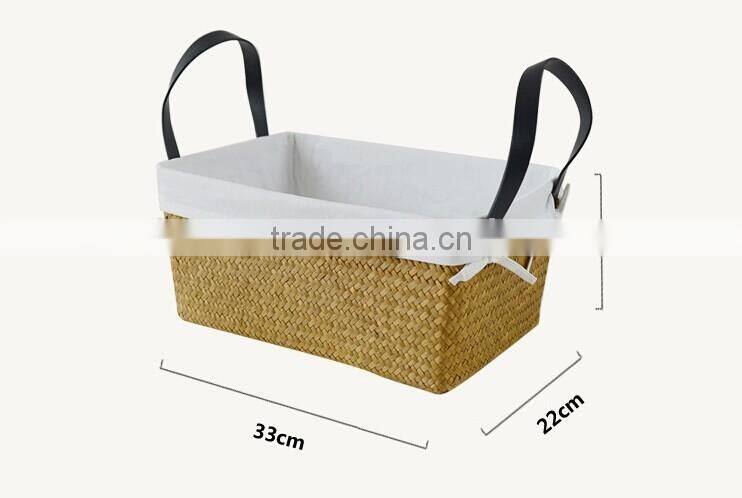 basket made of natural straw seagrass for housewaring with handle and lining