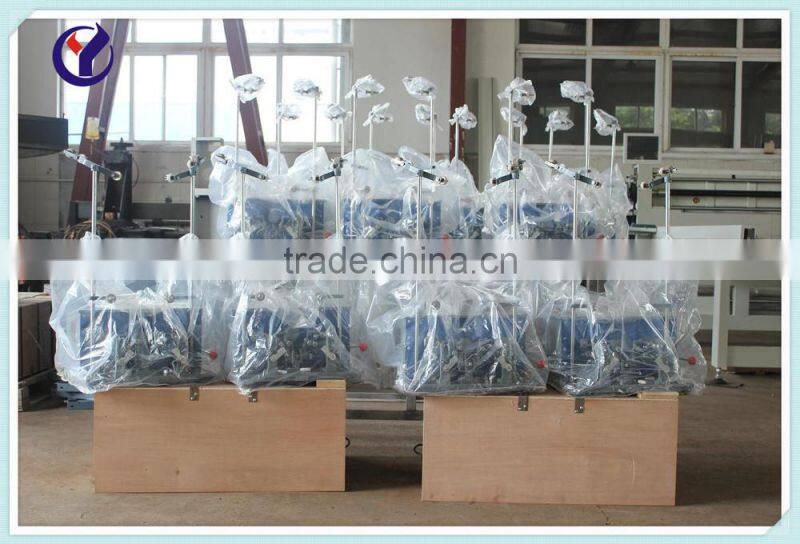 Double heads cocoon bobbin winding machine