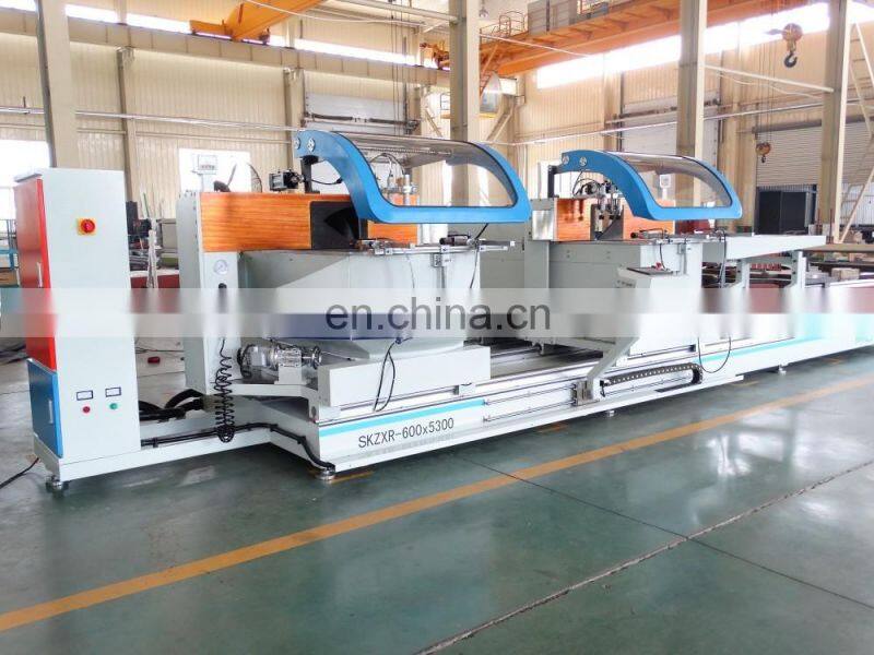 Double head miter saw for aluminum window profile