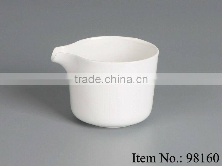 delicate white ceramic coffee creamer
