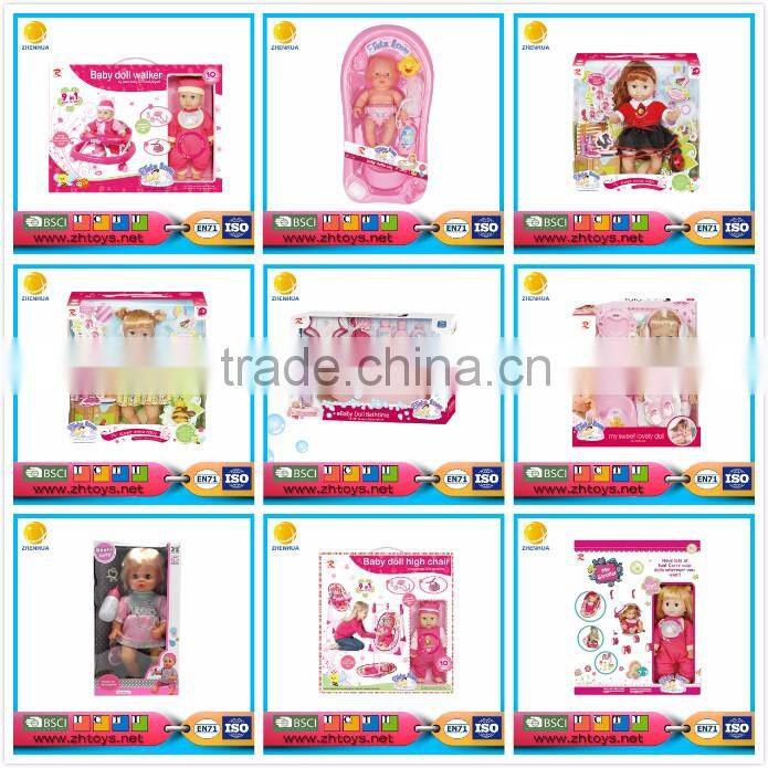 14 inch ic doll with nice clothes and gold hair carrier stroller and plastic basket