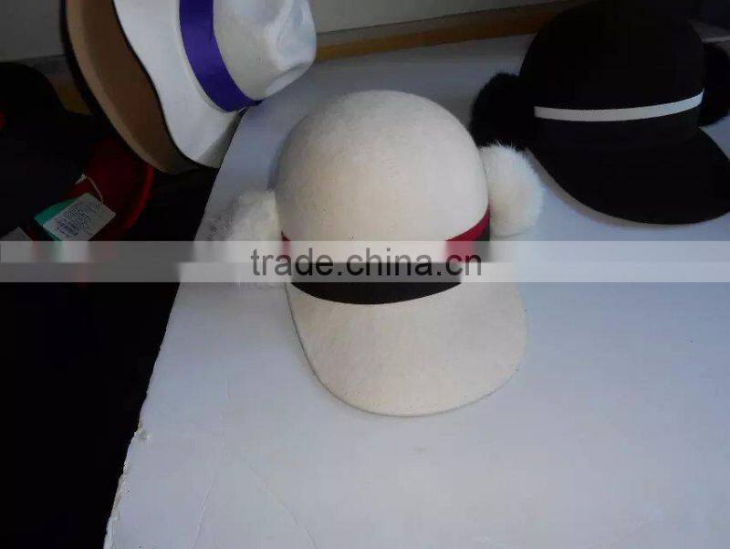 wool felt hat with fur ball
