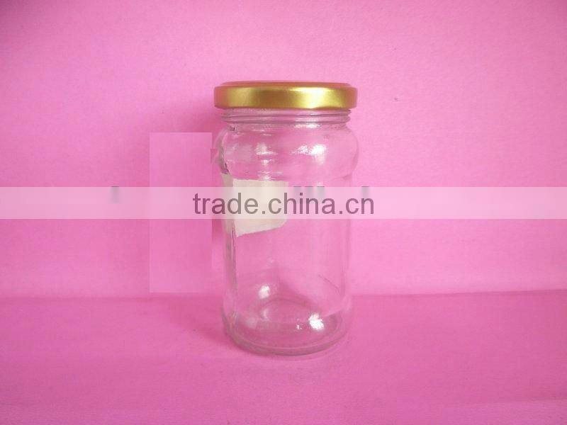 small glass container, glass pickle bottle