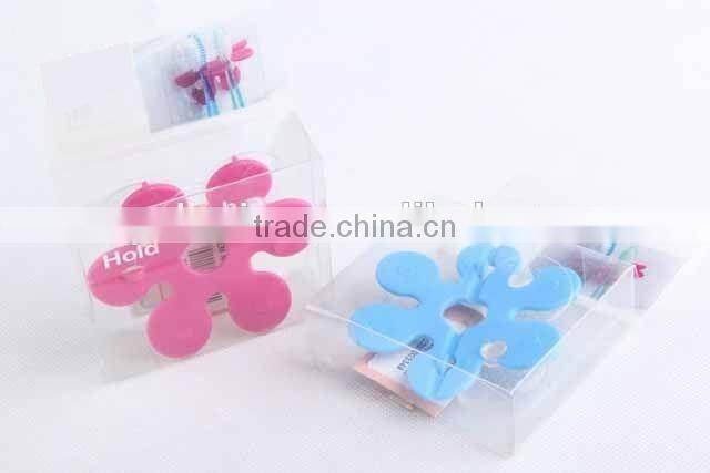 Flower shaped with two suckers folding toothbrush holder