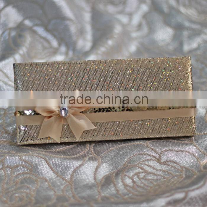 Hot sale attractive golden hardcover folded wedding invitations with paillette ribbons bowkont & crystal decoration