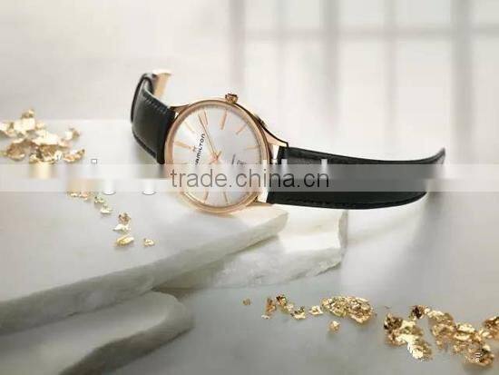 rose gold bezel watch with leather band day/date display timepieces