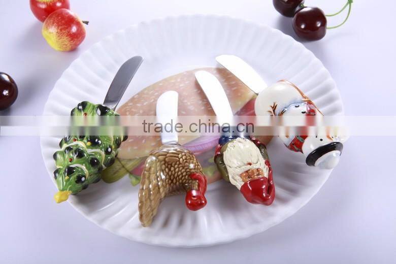 Top quality Snow man design Christmas products butter knife with polyresin head
