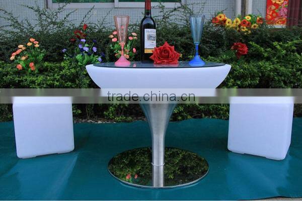 Battery rechargeable LED plastic rotating round production table with legs metal