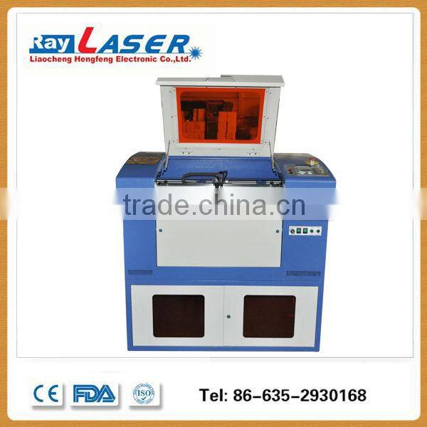 good character acrylic wood co2 laser engraving cutting machine with good after-sales aervice overseas