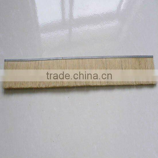 Metal channel flexible strip brush
