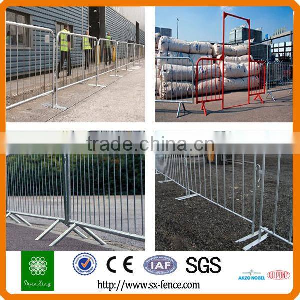 Yellow used road safety barrier, stage barrier