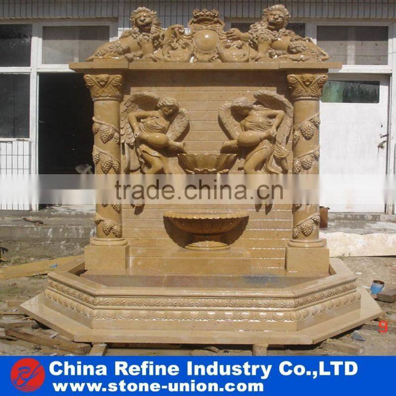 wall fountain carved with human figures