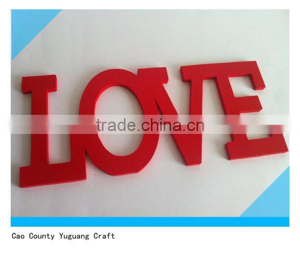 Red Wooden letters "love" for wedding decor