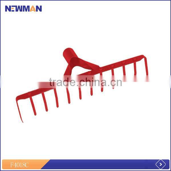 red color riveted grass lawn rake