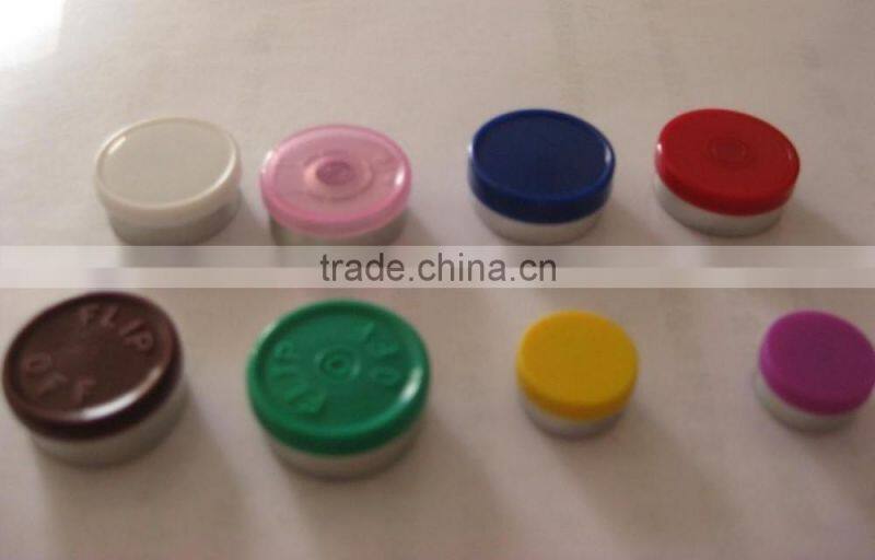 Flip-off cap of aluminium and plastic for glass infusion bottle