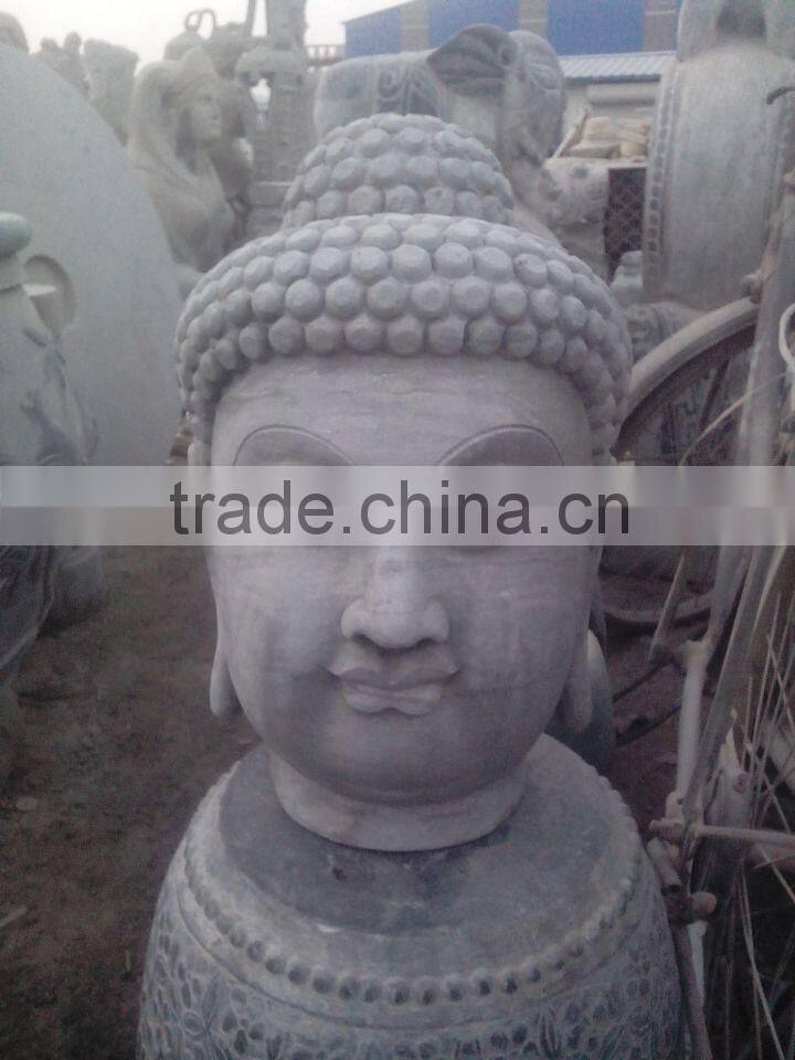 white marble stone buddha head