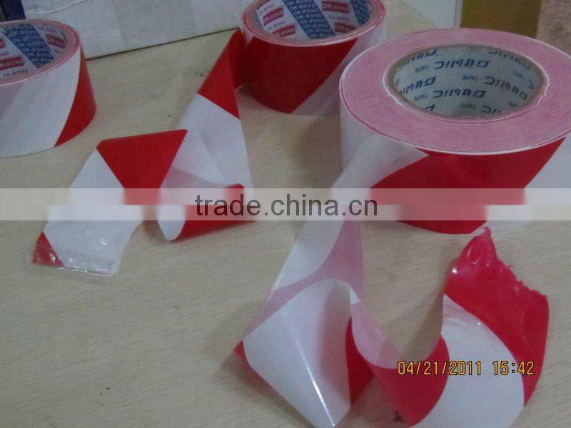 Black and yellow barrier tape