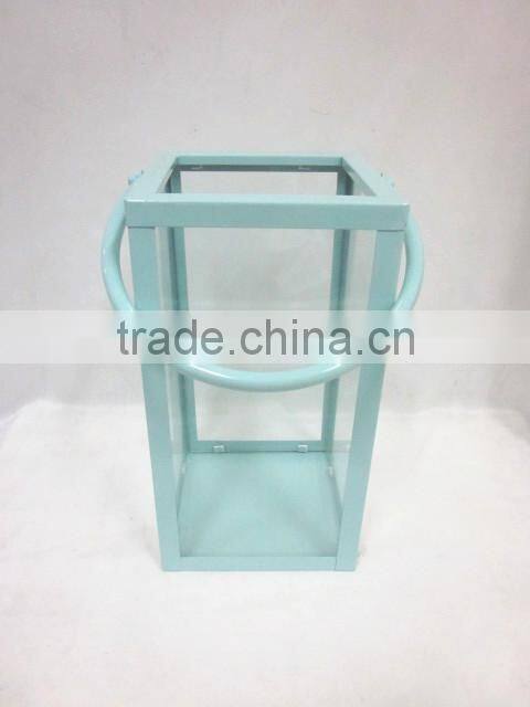 square metal lantern with clear glass piece