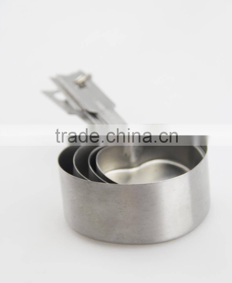 Stainless steel heart measuring cup