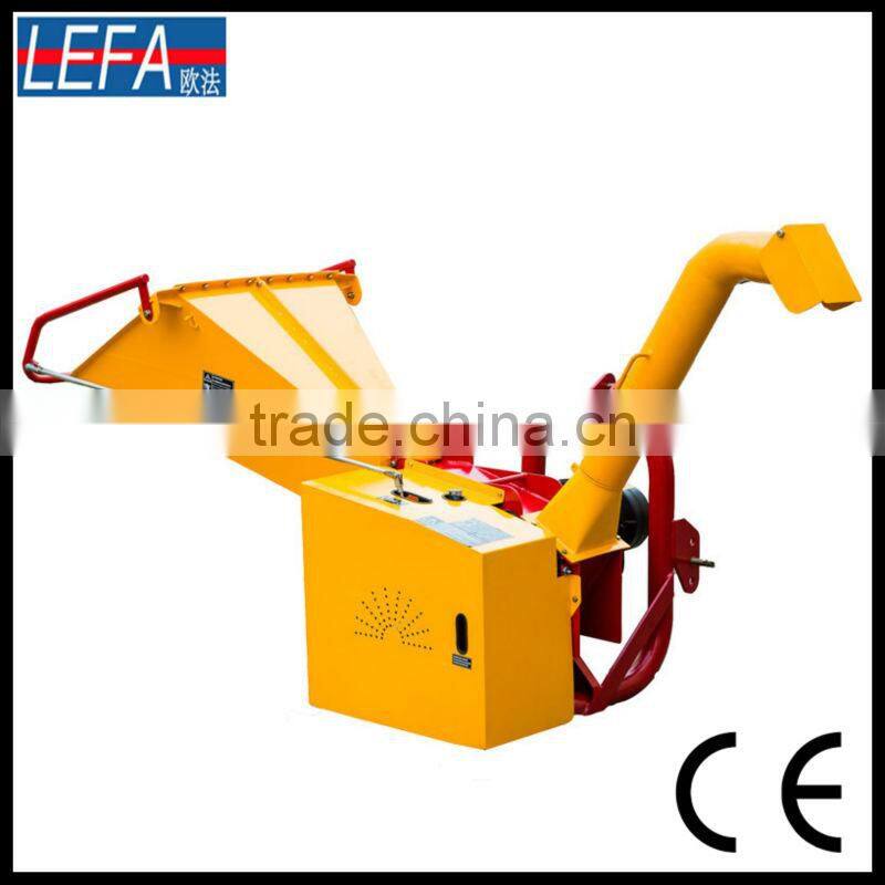 palm tree branch and trunk wood chipper