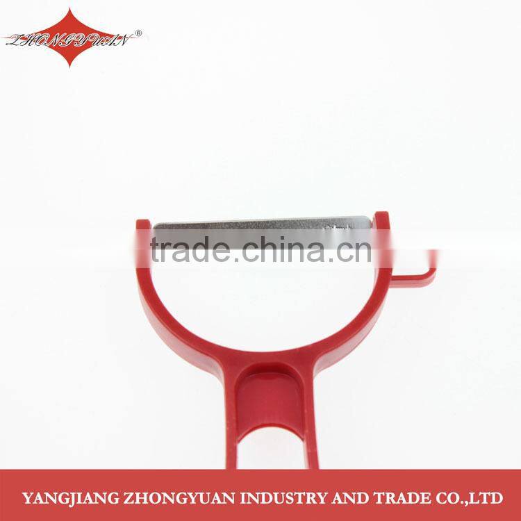 Stainless steel Y peeler with red ABS handle