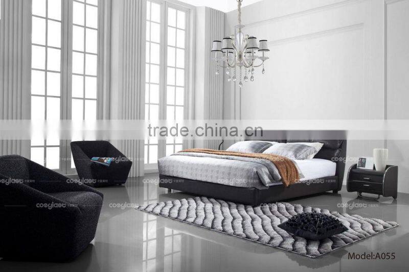 Super comfortable black leather bed