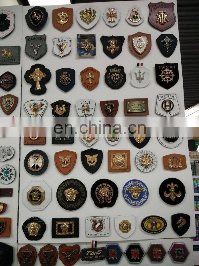 Popular branded faux leather patch label with metal for clothing