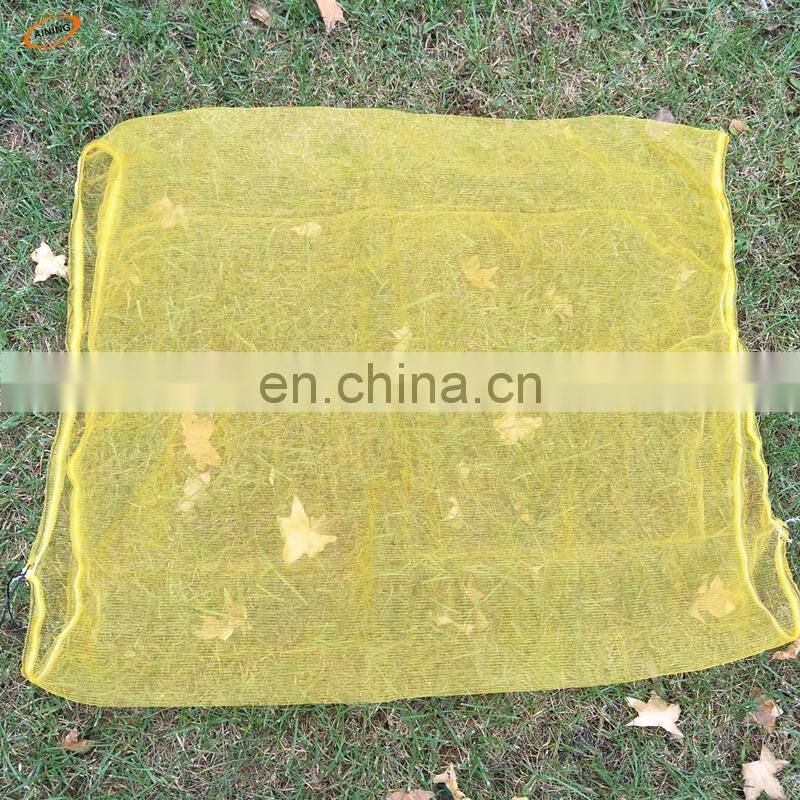 plastic mesh bag for harvesting the dates and the mangos