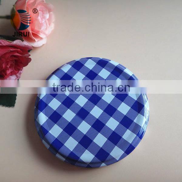 blue colour metal screw cap with white knots