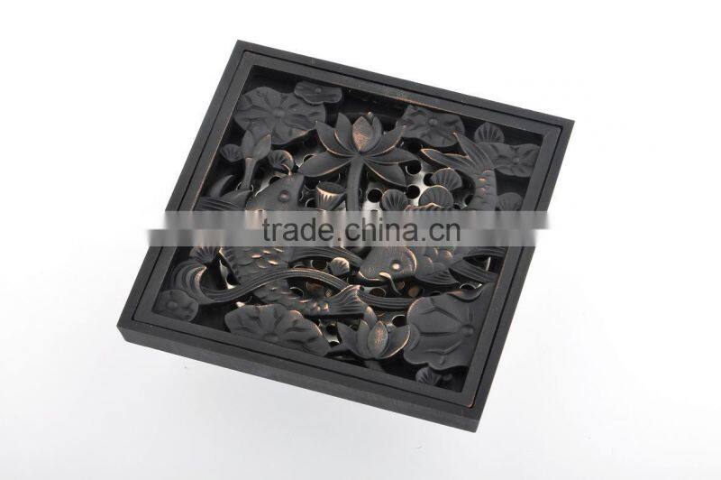 oil rubbed bronze art floor drain
