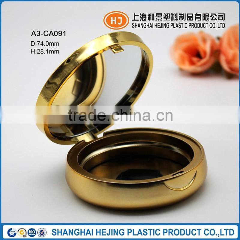 Round spray coating finish compact powder container