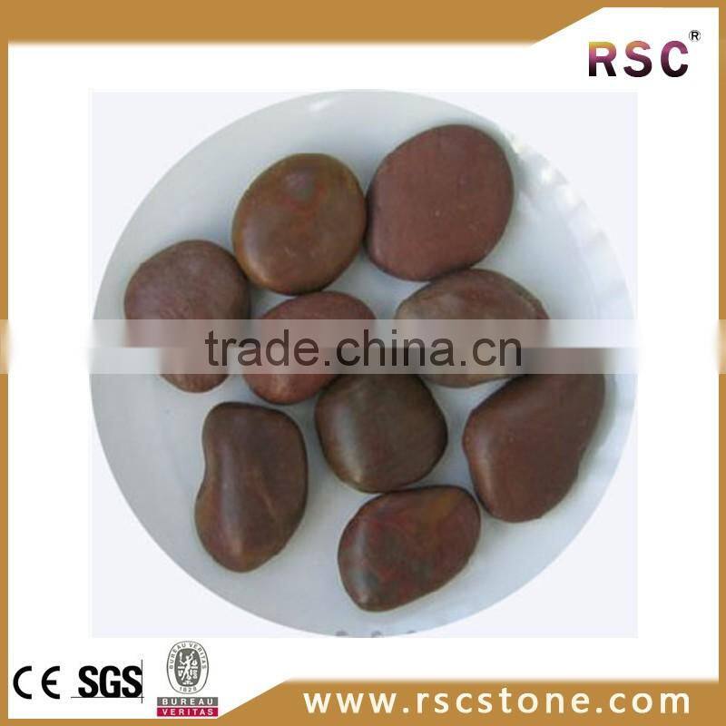 Red glow in the dark pebble stone