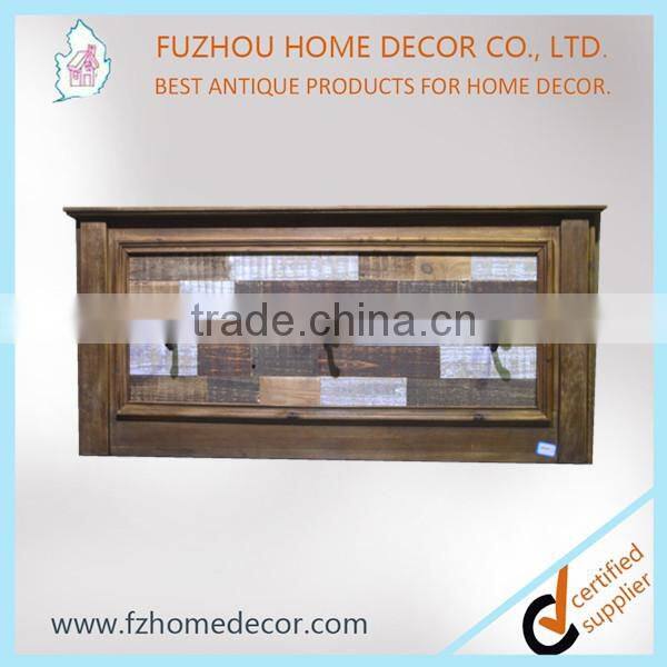 Wooden strips board with metal hooks for hanging clothes