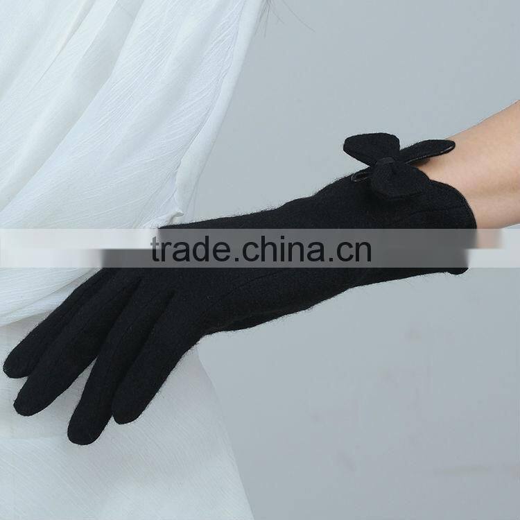 magic knitted woolen glove with matching bow tie on vent