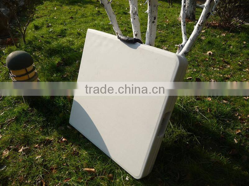 4-foot blow moulded plastic suitcase fold in half table