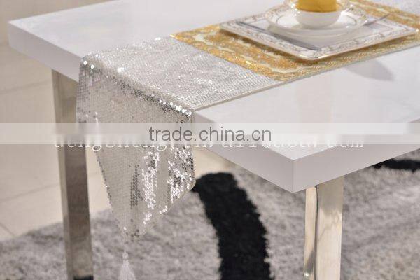 wooden dining table with stainless steel legs