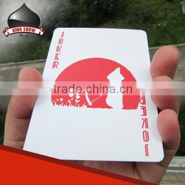 paper and plastic tarot cards packed into tin box for game