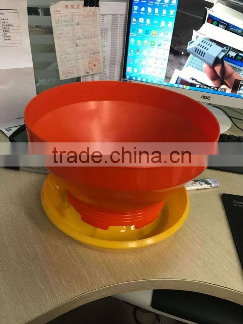 Plastic gravity-flow chick or quail feeder