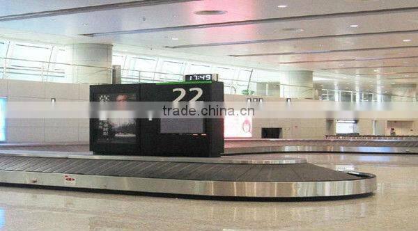 Airport baggage turntable carousel conveyor system