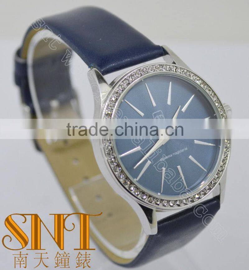 Navy texture dial with stone topring watch, smooth navy leather strap