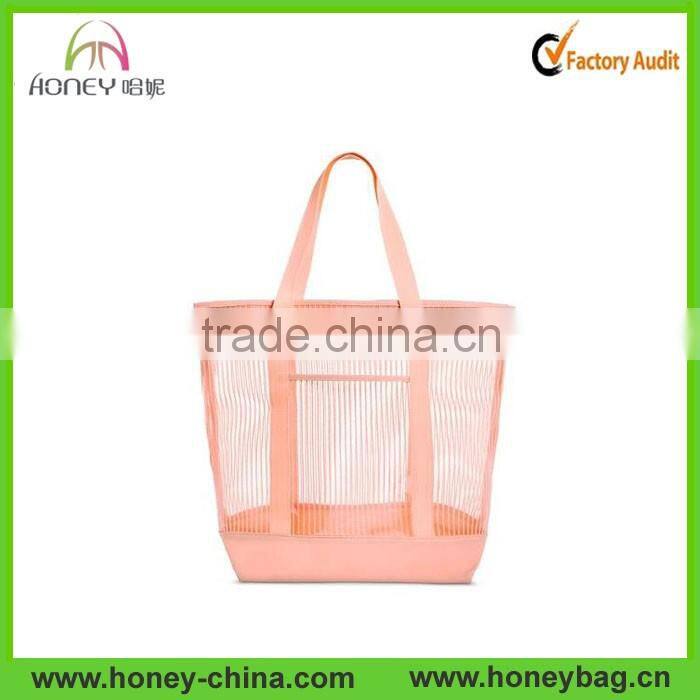 Totes handbag hit the beach in style with the mesh beach bag in navy