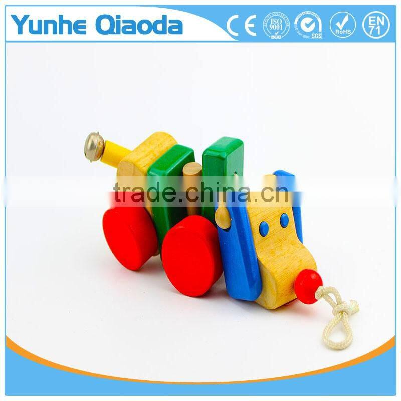 colorful Pull Along wiggles Dog Wooden Toy wiggles as you pull they make a clicking sound and make a fun baby