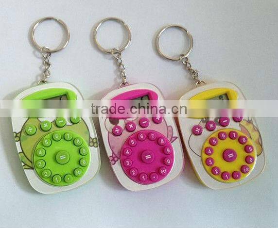 Mini plastic pocket calculator with keyring