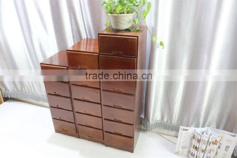 Brown color wood cabinet with many drawers