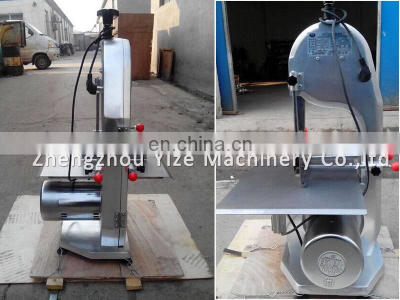 Meat and bone cutting machine